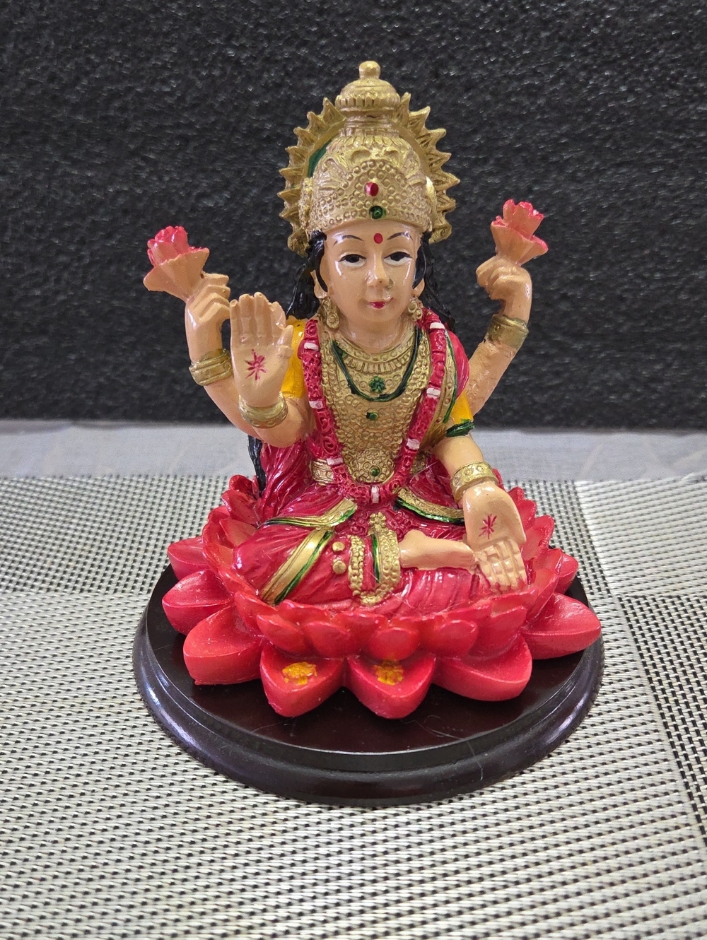 Red Goddess Lakshmi Statue on Lotus